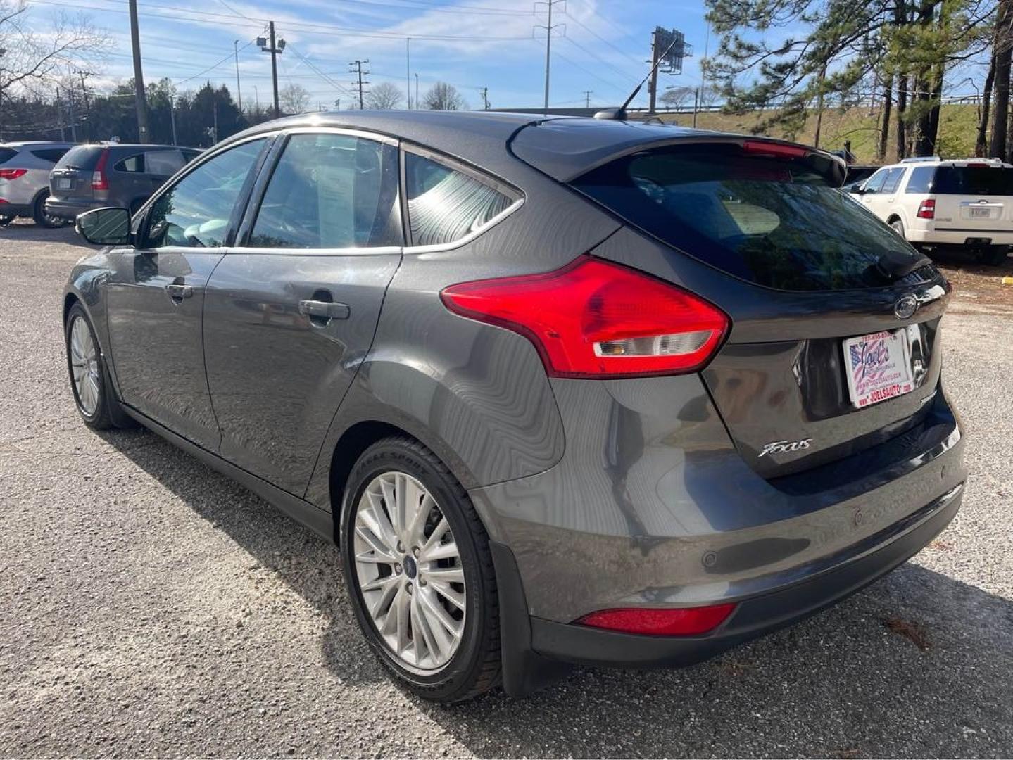 2015 Grey /Black Ford Focus Titanium (1FADP3N26FL) with an 2.0 4 CYL engine, Auto transmission, located at 5700 Curlew Drive, Norfolk, VA, 23502, (757) 455-6330, 36.841885, -76.209412 - Photo#3